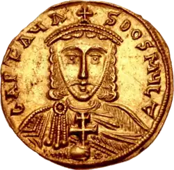 Photographie d'une face d'une pièce de monnaie, représentant le buste d'un homme.