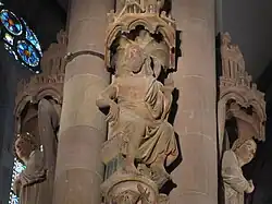 Photographie de Jésus-Christ sur son trône, entouré de deux anges.