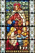 Vitrail Jésus enseigne aux enfants