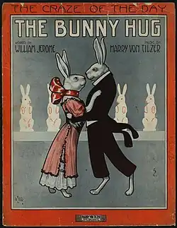Couverture de partition musicale montrant des lapins antropomorphiques dansant le bunny hug, illustrée par André De Takacs (1912).
