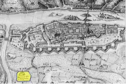 Plan d'une ville au XVIIe&nbsp;siècle sur lequel une zone est matérialisée en couleurs.