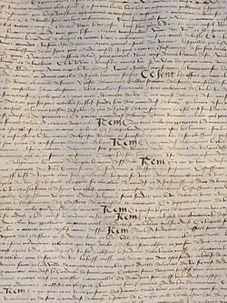 Détail du texte original du traité d'Arras - exposé au Musée de Cluny en 2024.