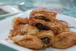 Substitut d'« oie » enveloppé dans de la peau de tofu.