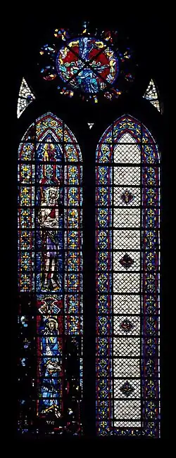 Verrière en deux lancettes de 45 panneaux vitrés. La lancette de droite est faite de verre blanc. La lancette de gauche, en verres de couleur en partie noircies, représente deux saints.
