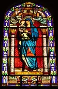 Vitrail de l'église. La Vierge à l'Enfant