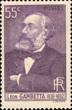 Timbre postal d'une valeur de 55 centimes de francs avec le portrait d'un homme barbu se tenant les bras croisés, surmontant un cadre avec son nom, ses années de naissance et de décès.