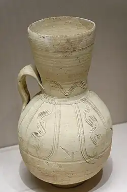 Gargoulette du Xe ou XIe&nbsp;siècle, équipée d'un filtre pour empêcher l'entrée de feuilles ou d'insectes.