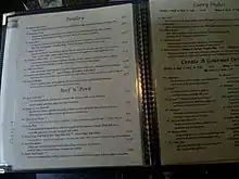 Photographie d'un menu avec plus de cent choix de plats.