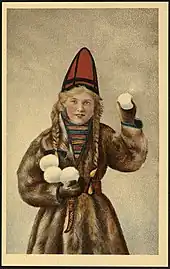 Dessin d’une jeune fille blonde tenant des boules de neige blanche entre ses mains.