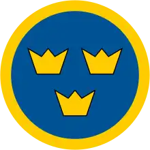 La cocarde de l'Armée de l'air suédoise, facilement reconnaissable à ses trois couronnes.