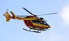 Un hélicoptère Eurocopter EC-145, utilisé par la Sécurité Civile française, survolant le port de plaisance de Minimes à La Rochelle au début de l' après-midi du dimanche 28 février 2010 après le passage dans la nuit de la tempête baptisée "Xynthia". Immatriculation de cet appareil: F-ZBPK. La Rochelle (Port de Plaisance des Minimes), Charente Maritime, France.