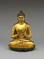 • Bouddha Vairocana.• Époque: Dynastie Tang VIIe – Xe&nbsp;siècle.• Bronze doré. Hauteur: 20,3 cm.• Metropolitan Museum of Art, New-York.