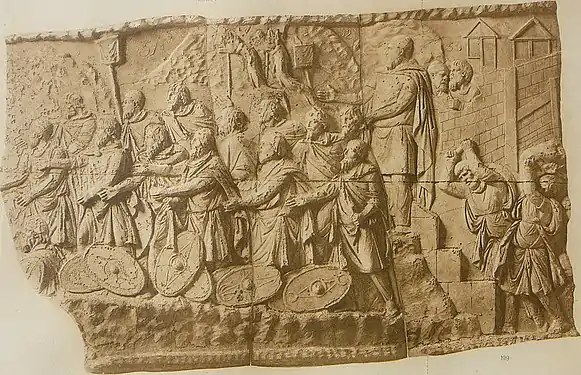 Colonne trajane :subjugation des Daces (scène LXXV)départ de la population autochtone (scène LXXVI).