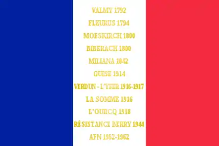 Drapeau français, en lettres d'or Valmy 1792 Fleurus 1794 Moeskirch 1800 Biberach 1800 Miliana 1842 Guise 1914 Verdunl-l'Yser 1916-1917 La Somme 1916 L'Ourcq 1918 Résistance Berry 1944 AFN 1952-1962