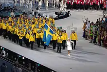 Photographie de l'entrée de la délégation suédoise lors de la cérémonie d'ouverture.