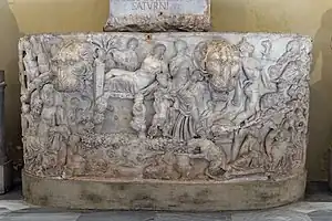 Sarcophage en forme de cuve. Dionysos et Ariane au dessus d'une scène de foulage, dans une cuve, lènos. Couchés: à g. dieu au calathos, à dr. femme au vase renversé.240-250 EC. Musée Chiaramonti, Vatican