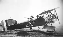 Photographie sépia d'un avion Breguet 14, au sol.