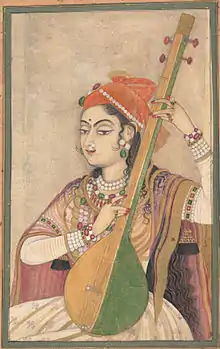 Joueuse de tanpura. Kishangarh, 1735. Dessin coloré. Encre, couleurs opaques et transparentes, or sur papier, 47 × 33.7 cm. Metropolitan Museum of Art