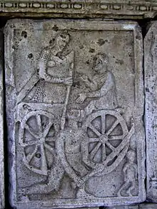 XXXV : un légionnaire romain avec une manica et une lance avec un Dace