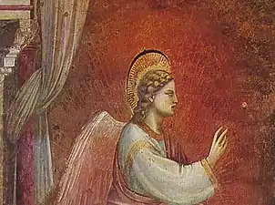 Détail de fresque. Un halo composé de rayons rouges émane de l'ange tourné vers la droite.