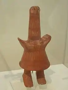 Figurine de terre cuite,VIIe&nbsp;siècle&nbsp;av. J.-C., atelier de Thèbes,modèle pour la mascotte des Jeux olympiques d'Athènes en 2004.