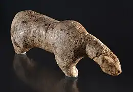 Figurine représentant un ours ou un lion des cavernes.