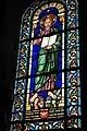 Vitrail du Christ portant les armoiries de l'architecte Abadie.