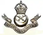 Insigne du 10e&nbsp;régiment baloutche avec la couronne Tudor.