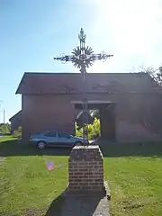 Quatre croix de chemin.