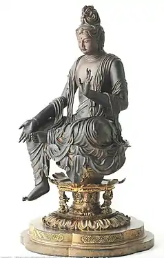 Bosatsu assis en délassement. Fin VIIIe&nbsp;siècle. Bois peint, H. 124&nbsp;cm. Hobodaiin Gantokuji. Kyoto.