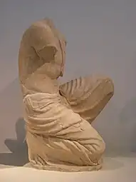 Angle sud-est.Figure de jeune homme.