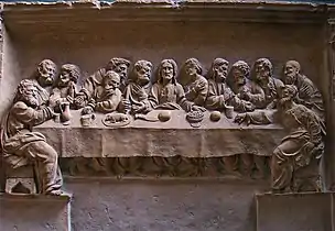 Haut-relief de la Cène dans les fonts baptismaux, datant du XVIe&nbsp;siècle.