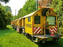 Train meuleur SRR16M-1 des voies du tramway de Bruxelles, spécialisé pour les environnements urbains à fortes contraintes