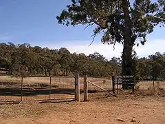 Entrée du parc naturel de Canberra (en) à Red Hill.