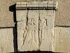 Clé de linteau, datée de 1841