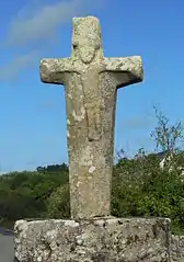 Croix du Requer, face du Christ en croix (XIIIe&nbsp;siècle).