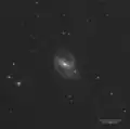 Image de NGC 1097 par le télescope Schmidt dans l'ultraviolet.