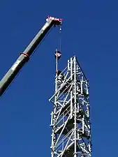 Montage du parafoudre sur le pylône.