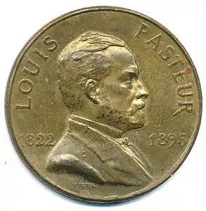 Monnaie de 1/10e d'Europa, portrait de Louis Pasteur (1928), bronze, 32 mm.