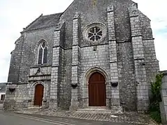 Portails d'entrée et rosace de la façade ouest.