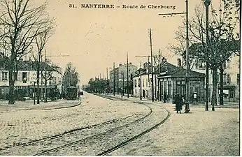 La RN 13 dans les premières années du XXe&nbsp;siècle. Les rails sont ceux du tramway Paris - Saint-Germain qui circula de 1890 à 1935.