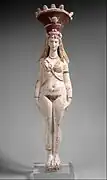 Isis-Aphrodite au calathos. Terre cuite peinte sur engobe blanche, H. 49,5 cm. IIe siècle EC. Met