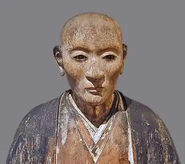 Portrait. Bois peint et laqué incrusté de cristal de roche (yeux). Début XVIIe&nbsp;siècle époque d'Edo. Japon.