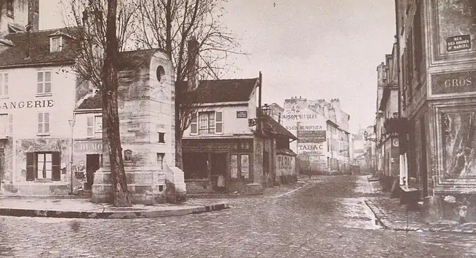 La rue Poliveau vers 1860-1865 avec la fontaine Poliveau, photographiées par Charles Marville.