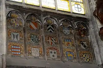 Fresques blasonnées sur les murs du transept sud (XXe&nbsp;siècle)