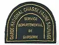 Écusson d'épaule gauche de la tenue de représentation de Garde national de la chasse et de la faune sauvage de l'ONC vers l'an 2000.