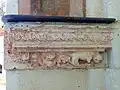 Base du clocher, console à dr. de l'arcade orientale.