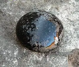 Un lissoir en verre&nbsp;(de) retrouvé à Glashütte Klein Süntel&nbsp;(en)