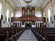 Vue de la nef vers la tribune de l'orgue Rinckenbach (1884).