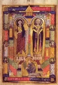 Le moine-prêtre Ratmann remet le codex à l'archange Michel et à l'évêque Bernward.